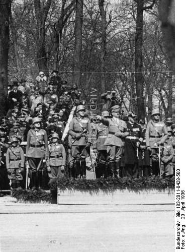 Adolf Hitler reviewing a military parade held in celebration of his 47th birthday